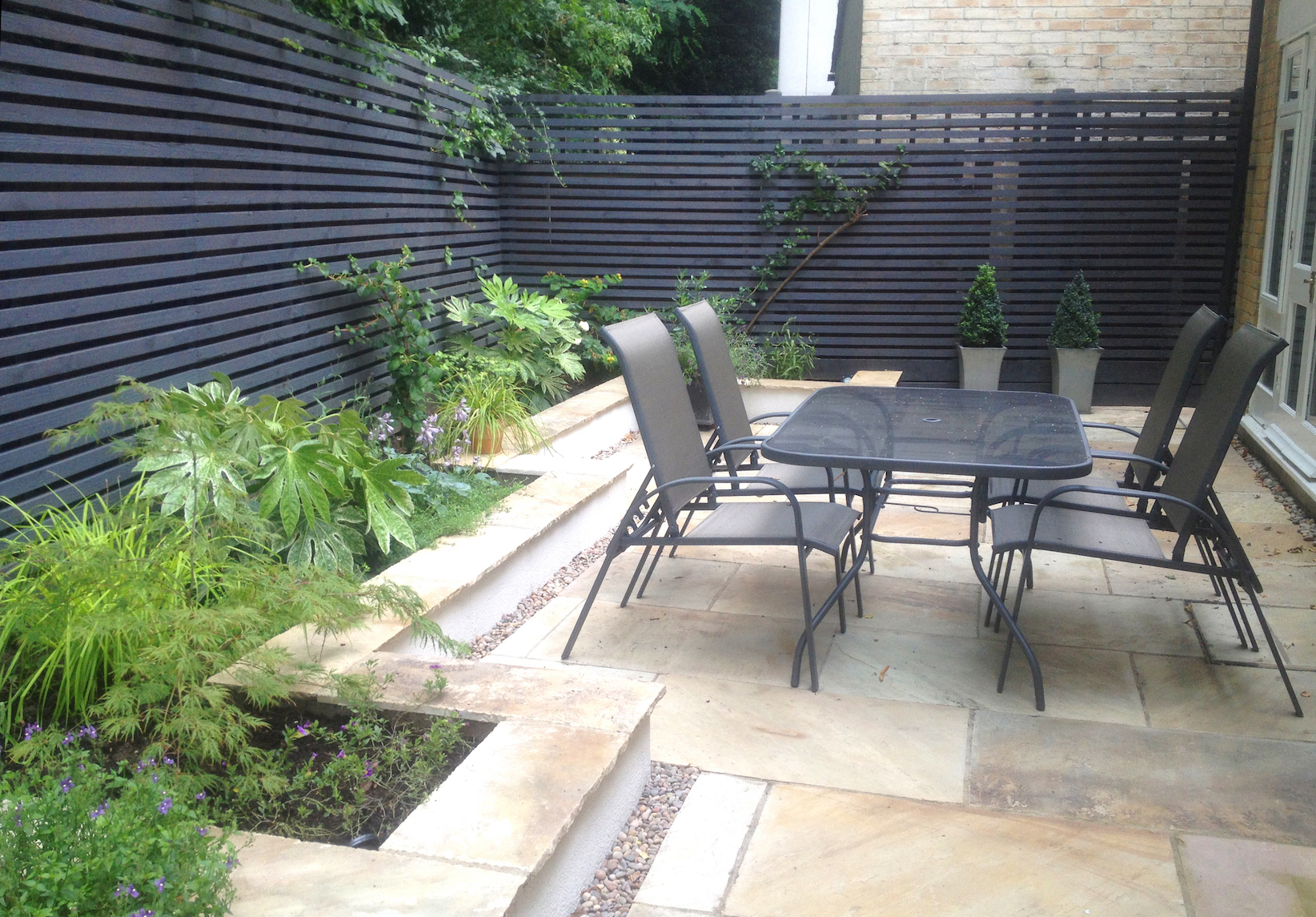 Slatted trellis screening | Brightling Garden Designs